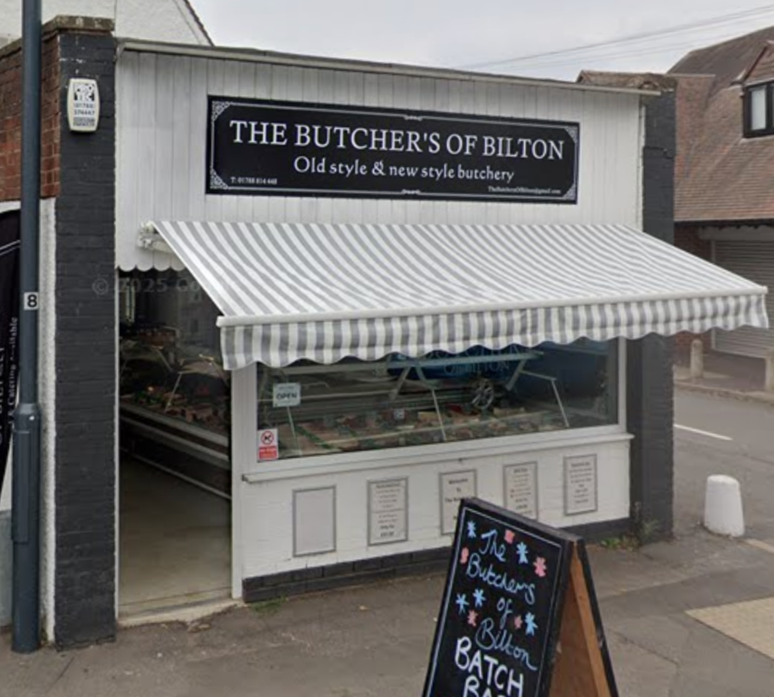 Front of The Butchers of Bilton shop at 14 The Green, Bilton, Rugby